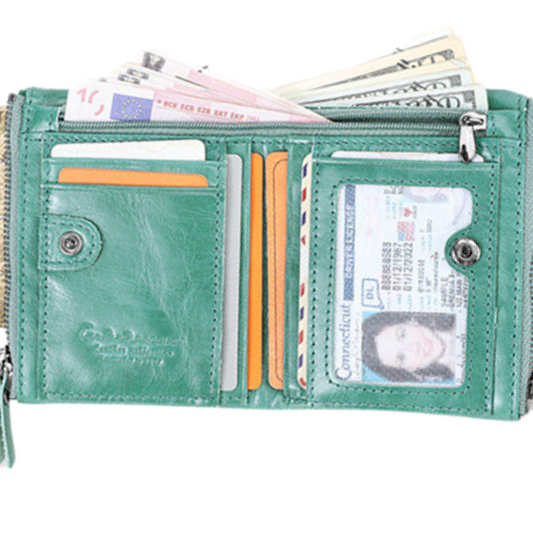 Inside view of a green top grain leather wallet showcasing credit card slots, ID compartment, and cash section.