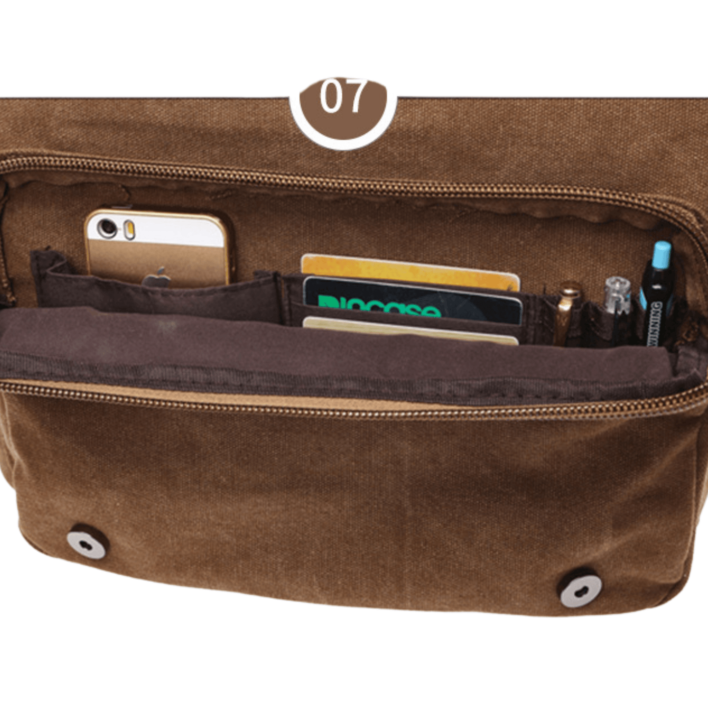 Interior view of a brown canvas messenger bag displaying pockets for phone, credit cards, and pens.