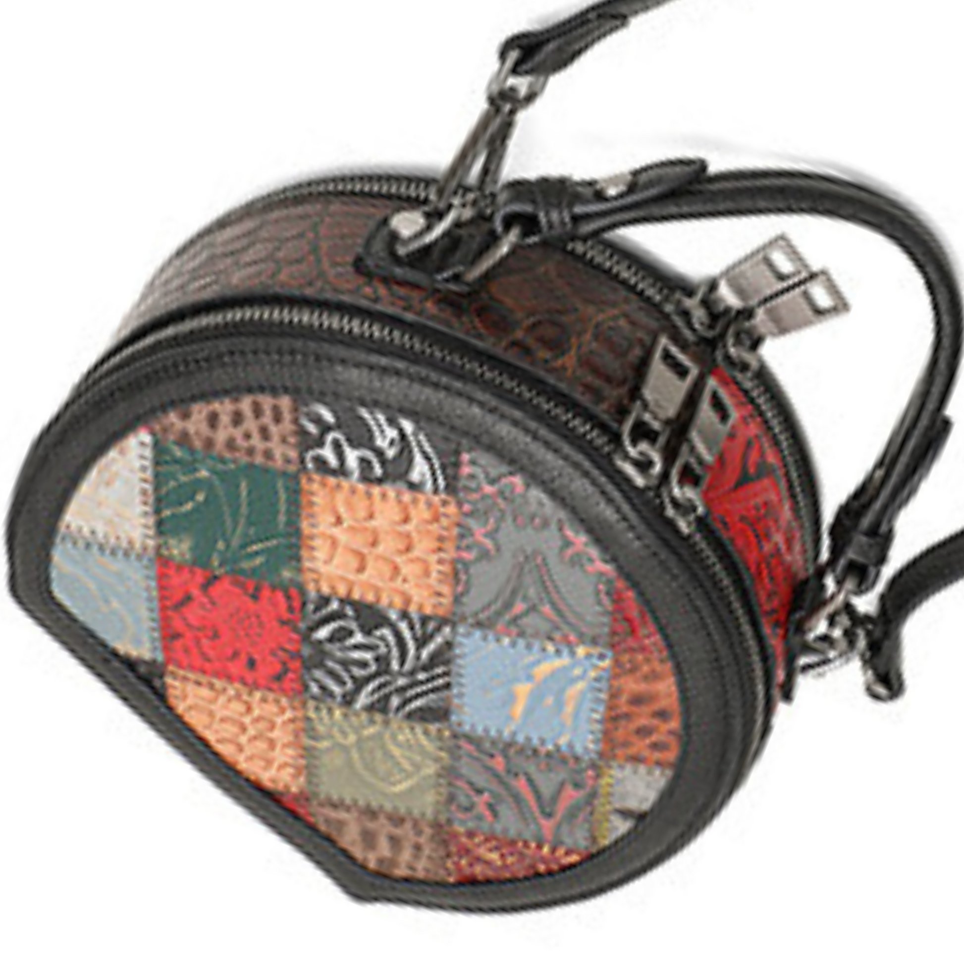 Women's round crossbody handbag in patchwork design with black accents and dual zipper openings.