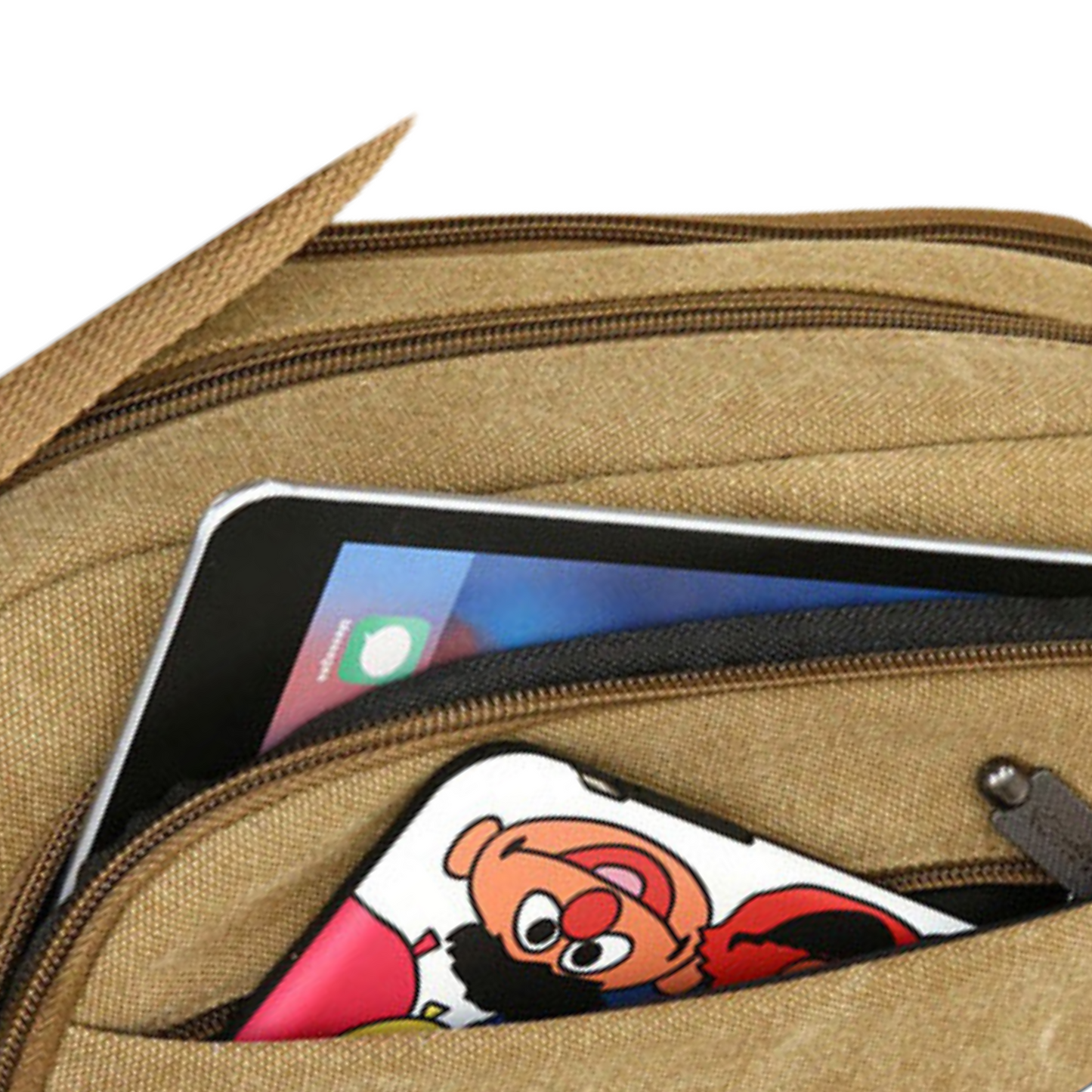 Close-up of a Small Canvas Satchel Bag with an iPad and a phone case featuring a cartoon character.
