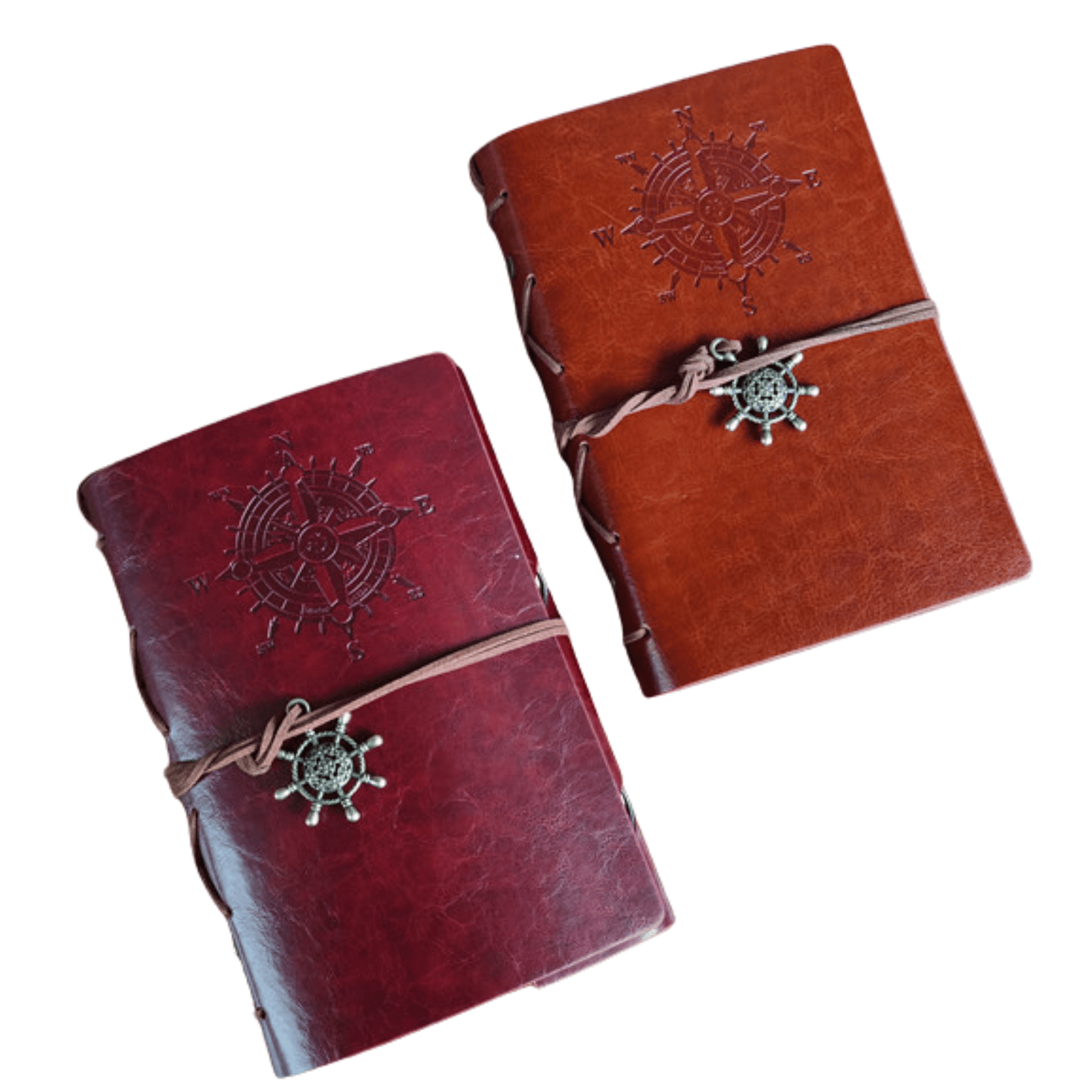 Genuine leather bound travel journals in dark red and brown with compass insignia, perfect for writers and travelers.