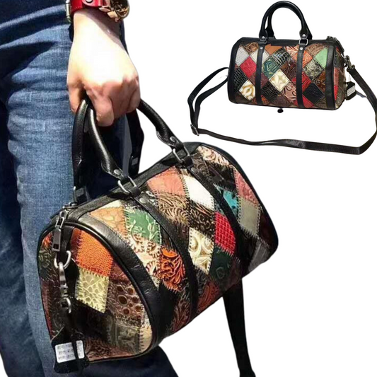 Stylish women's patchwork leather duffle bag held by a person, perfect for travel and everyday use.