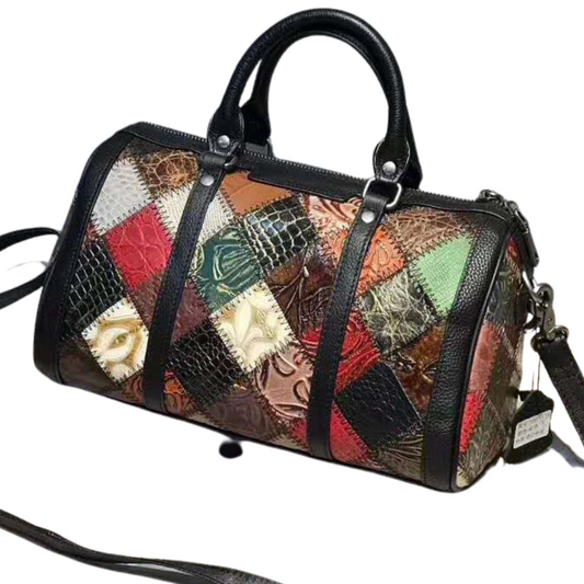 Colorful women's leather cross body duffle bag with unique patchwork design and detachable strap.
