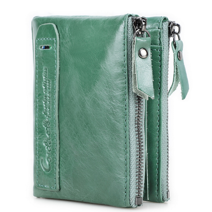 Women's top grain leather wallet in green, featuring zippered compartments and stylish design.